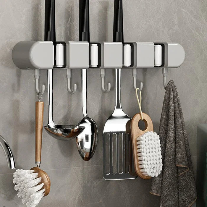 Versatile wall support for household tools 